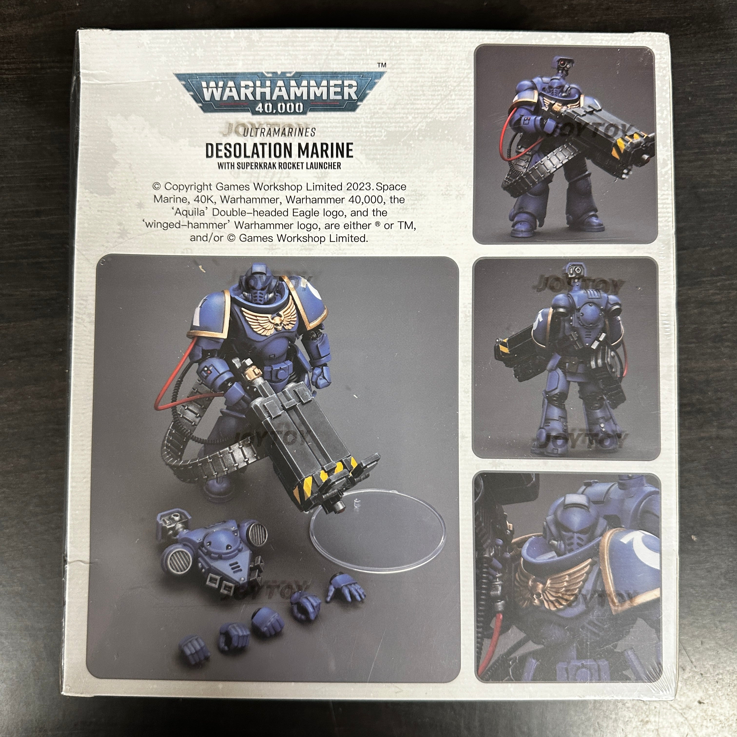 JOYTOY Desolation Marine with Castellan Launcher Superkrak 1/18
